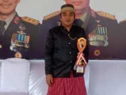 Berprestasi, Kades Buttu Baruga Aripin Tarima Piala di HUT Bhayangkara